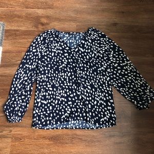 Blue and white polka dot blouse